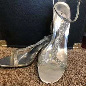 A low silver heel made by Pierre Dumas